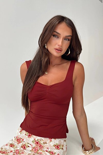 World Fashion Trends بلوزة مرنة بفتحات جانبية ومجمعة من الأمام