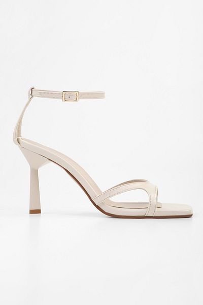 Shoeberry Women's Violen Ecru Skin Heeled Shoes