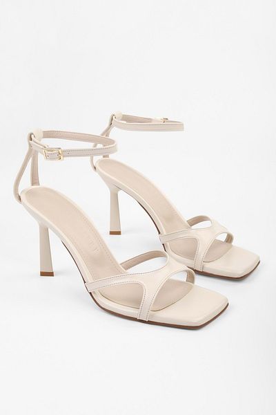 Shoeberry Women's Violen Ecru Skin Heeled Shoes
