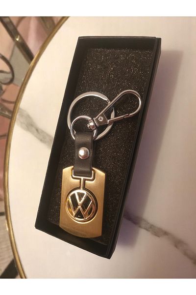 Land of Souvenir Elegant Design Leather and Metal Volkswagen Compatible Car Keychain in Golden Yellow Color