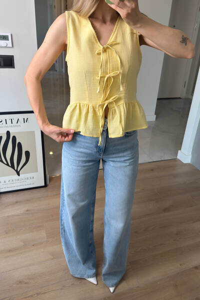 Sue Store Κίτρινη αμάνικη μουσελίνα μπλούζα με δέσιμο μπροστά