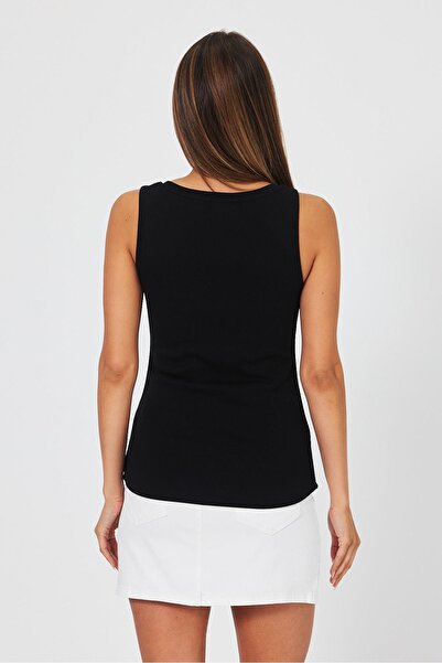 VENA Matilda Black Women's Undershirt - Button Detailed and Seated on the Body