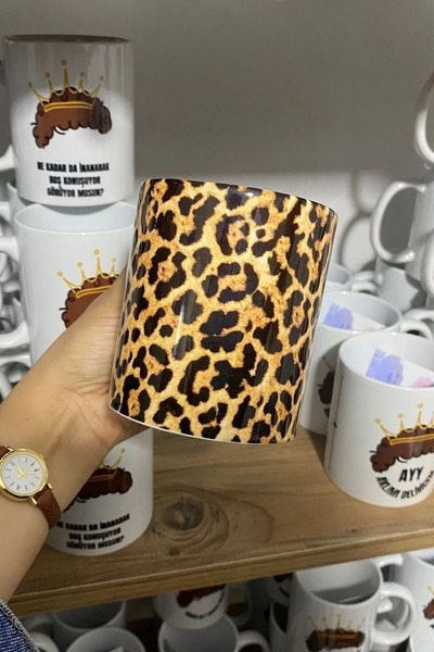 thekam كوب بورسلين بطبعة جلد الفهد - جودة، مفهوم كام