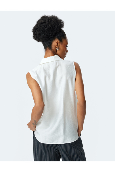 Koton Classic collar viscose sleeveless shirt.