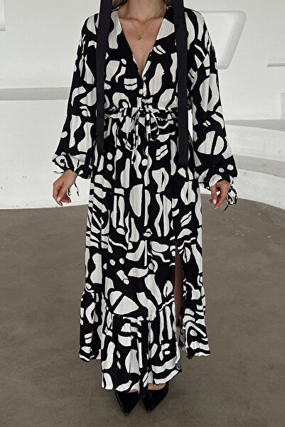 Olcay Detailní vzorované šaty s výstřihem do V a rozparkem ČERNÉ 9350-E