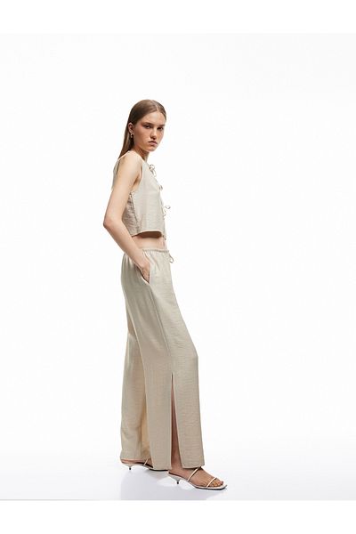Koton Viscose Fabric Comfortable Fit Slit Detailed Double Breasted Oversize Trousers with Laced Waist and Pockets