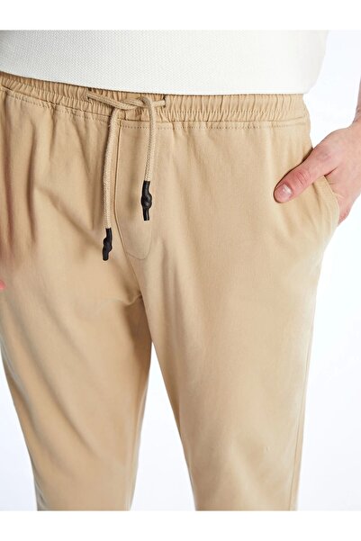 LC Waikiki Ανδρικό παντελόνι Jogger XSIDE Beige Slim Fit Gabardine