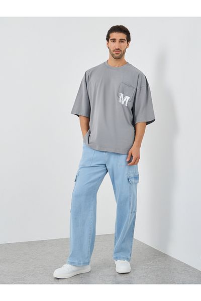 Styli Slogan Print Oversized T-Shirt with Chest Pocket Detail