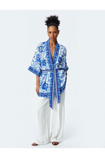 Koton Floral patterned long belted kimono jacket.