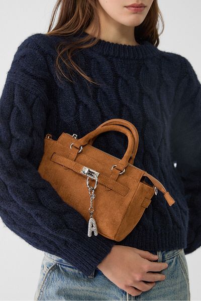 Stradivarius Key ring featuring an initial charm with rhinestones