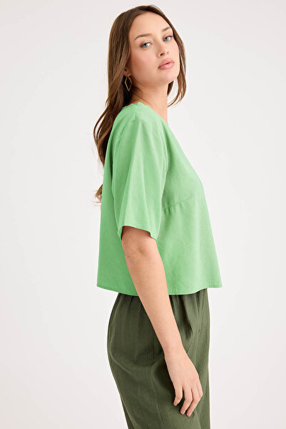 Vitrin Round Neck Short Sleeve Crop Blouse