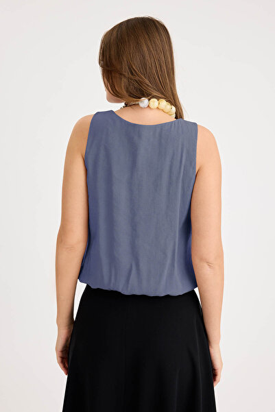 Vitrin Pleated Front Zero Sleeve Skirt Hem Elastic Blouse