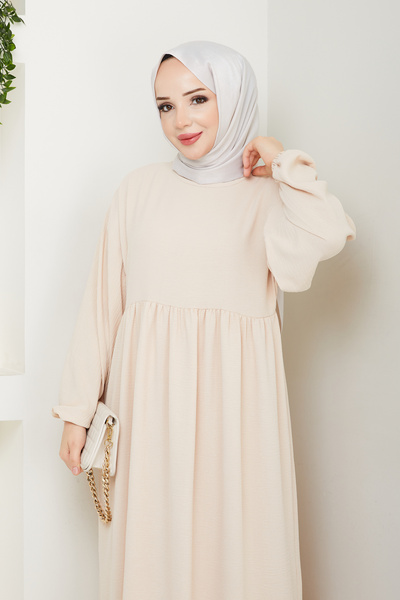 Sakara Collection tesettür bol kesim elbise kol ağzı lastikli bel den büzgülü uzun boy