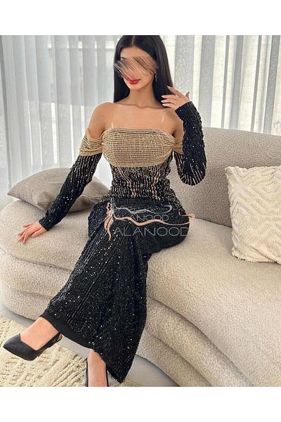 ALANOOD FASHION Yasmine Sabry's black and gold evening dress with an elaborate royal design
