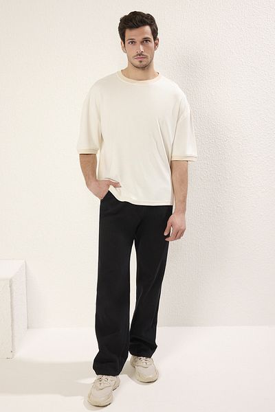 Trendyol Collection Μπλουζάκι με απαλή υφή εκρού Boxy Fit - TMNSS25TS00078