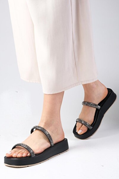 Mio Gusto Papuci plati pentru femei cu bandă gonflabilă de culoare neagră Karina