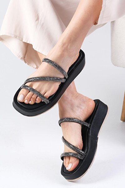 Mio Gusto Papuci plat pentru femei, cu bandă gonflabilă, de culoare neagră Palmira