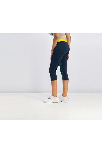 Reebok بنطال كابري رياضي نسائي، أزرق داكن وأخضر فاتح