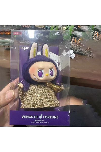 Miniso دمى فينيل أرجوانية جديدة بإصدار محدود من The Monsters Labubu X Pronounce Wings of Fortune