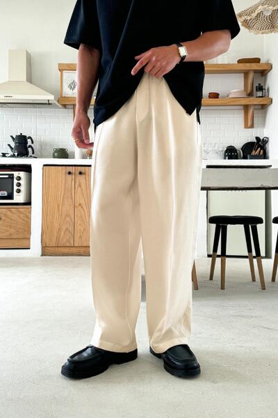 Flaw Wear بنطلون فضفاض بخصر مطاطي وقصة مريحة بلون كريمي بيج