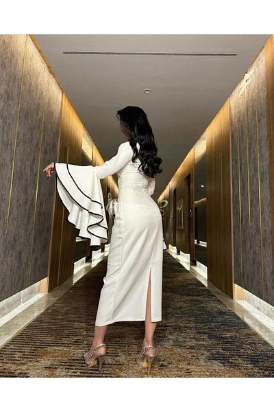 ALANOOD FASHION Black and white Eid dress with wide sleeves and a unique design