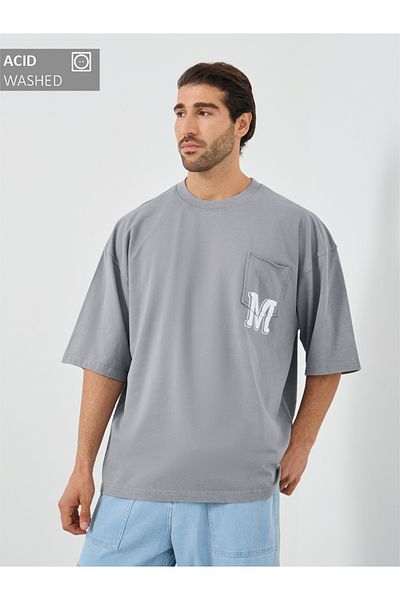 Styli Slogan Print Oversized T-Shirt with Chest Pocket Detail