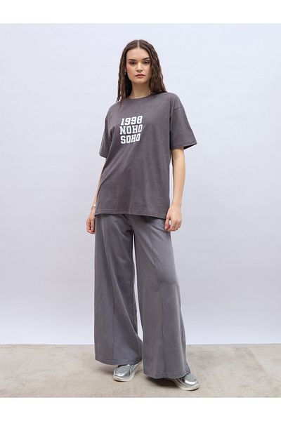 Styli Slogan Print Acid Washed Longline Oversized T-Shirt