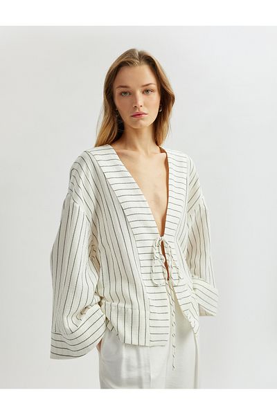 Koton Cotton tie detail long wide-sleeve double-breasted kimono jacket.