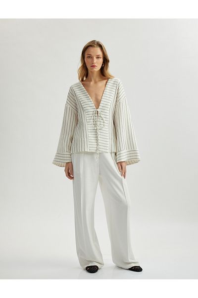 Koton Cotton tie detail long wide-sleeve double-breasted kimono jacket.