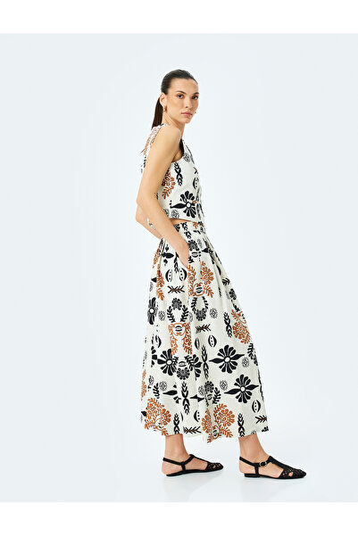 Koton تنورة ماكسي واسعة من الكتان بطباعة عرقية عالية الخصر.