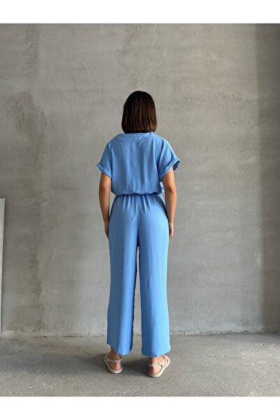BEJNA Women's Light Blue Button Detailed Belted Jumpsuit