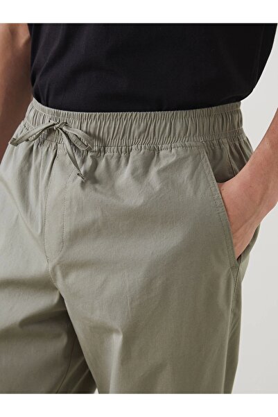 LC Waikiki Ανδρικό παντελόνι Jogger XSIDE Khaki Standard Fit