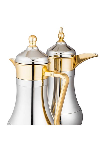 Dania A set of metal thermoses in the shape of a kettle, elegant and beautiful decoration for tea and coffee. The capacity is 1 liter for tea and 0.7 liters for coffee.