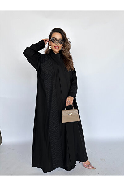 outline Black cloche abaya with black embroidery inspired by Saudi palm trees