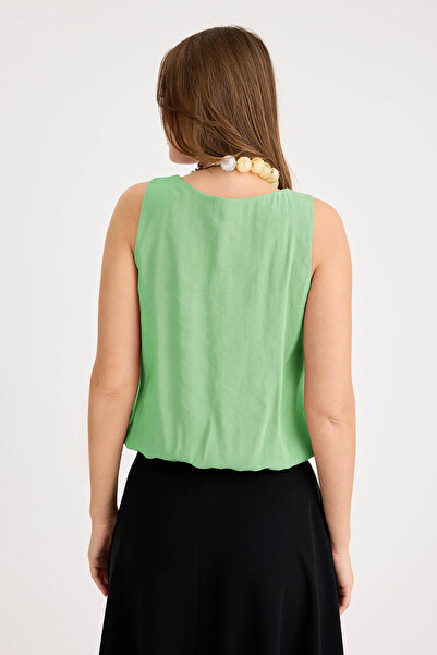 Vitrin Pleated Front Zero Sleeve Skirt Hem Elastic Blouse