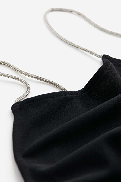 H&M قميص جيرسي ذو أشرطة