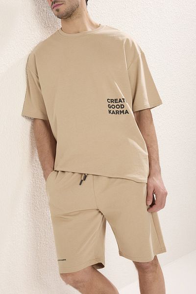 Trendyol Collection Μπεζ βαμβακερή αθλητική φόρμα - Χαλαρή εφαρμογή, τυπωμένα κείμενα TMNSS23EM00001