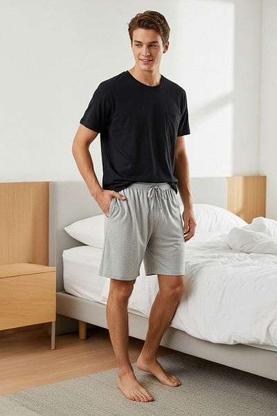 Trendyol Collection Schwarz-graues, regulär geschnittenes, gestricktes Shorts-Pyjama-Set TMNSS25PT00033