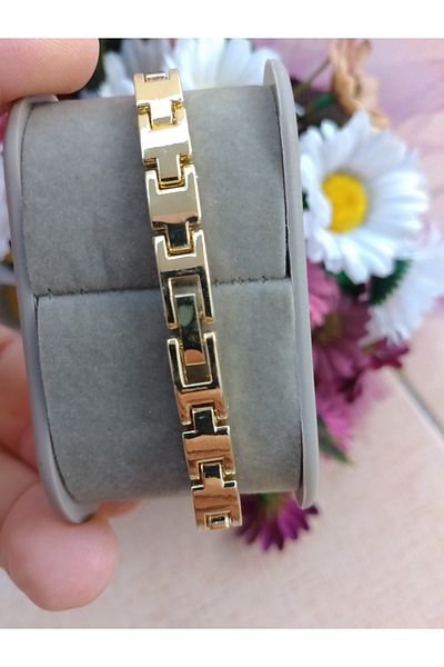 Enjoy ساعة يد نسائية باللون الذهبي مع قرص فيروزي Cluppolo Shine Elegance