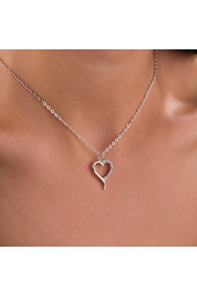 HOBİSY GIFT SHOP قلادة من الفولاذ بتصميم قلب من حجر الزركون - لون فضي غير قاب...