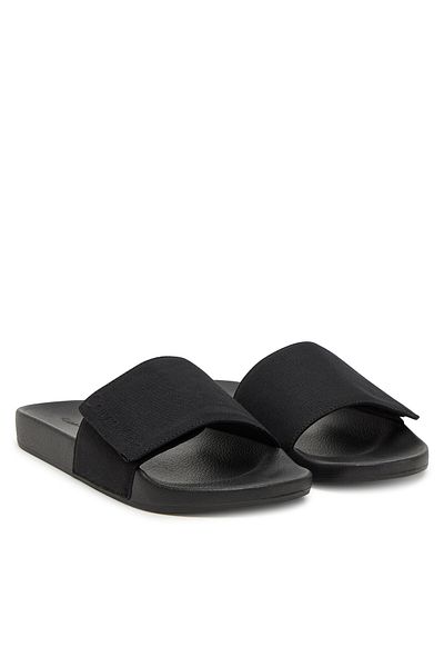 Calvin Klein شبشب رجالي مريح ومسطح أسود مع إغلاق لاصق HM0HM01749-BEH