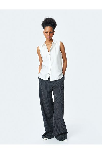 Koton Classic collar viscose sleeveless shirt.