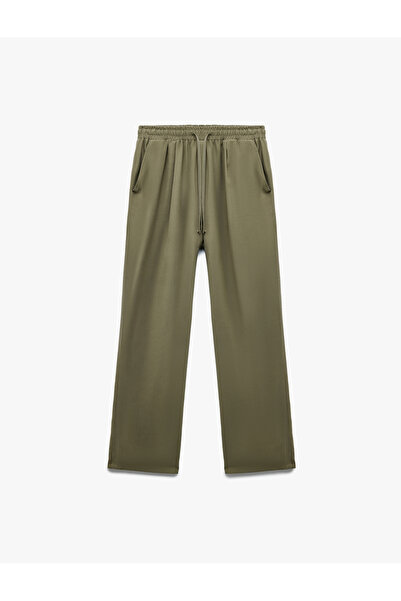 Koton بنطلون من قماش الفيسكوز كوبرو بخصر مربوط وجيب وواسع الساق