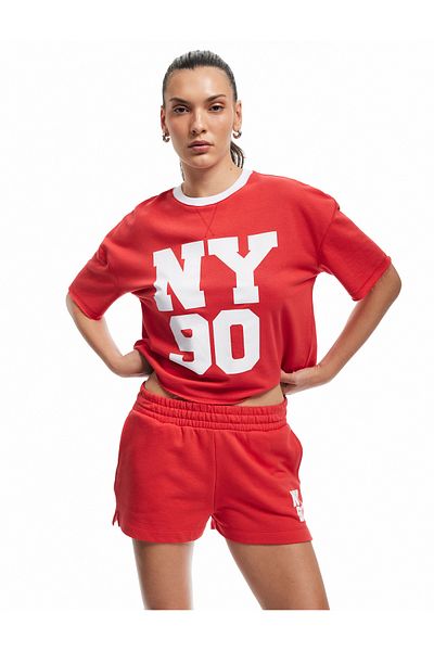 Koton Comfortable Fit Mini Sports Shorts with Elastic Waist and Printed Pockets