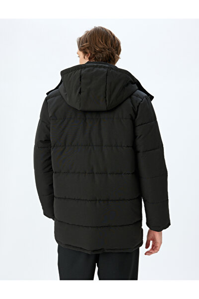 Koton Φουσκωτό παλτό με κουκούλα με λεπτή εφαρμογή με λεπτομέρεια τσέπης με φερμουάρ