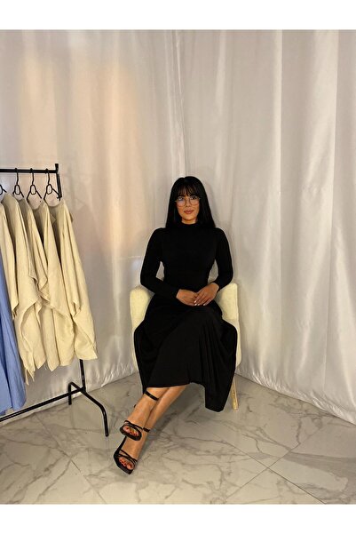 Butik "Günlük ve Gece Şıklığı İçin Siyah Midi Elbise – Uzun Kol, Esnek Kumaş"