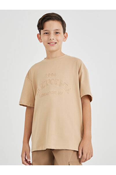 Styli Boys Typography Embossed Short Sleeve Oversized T-Shirt