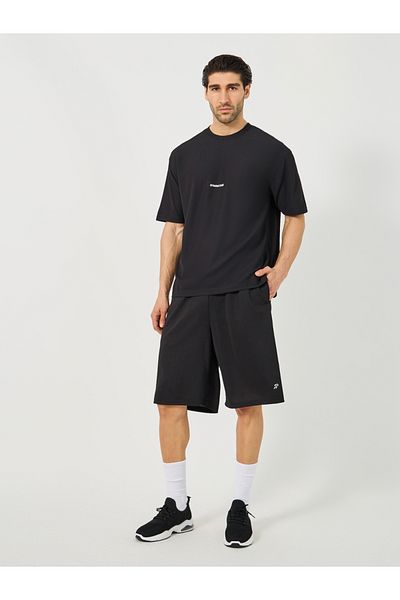 Styli Mesh Insert Oversized Training Shorts with Badge Detail