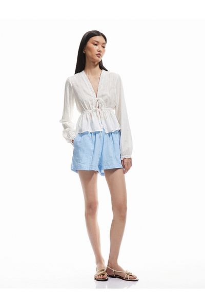Koton Mini pantaloni scurți din muselină din bumbac cu buzunar elastic cu talie înaltă