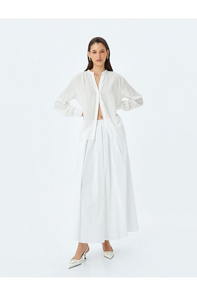 Koton Lined high rise maxi skirt with pockets.